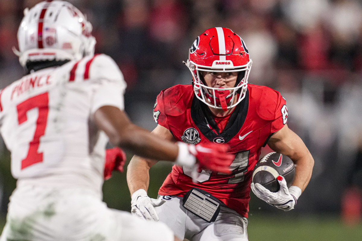 Georgia Bulldogs wide receiver Ladd McConkey (84) runs after a catch against the Mississippi Rebels during the first half at Sanford Stadium.
